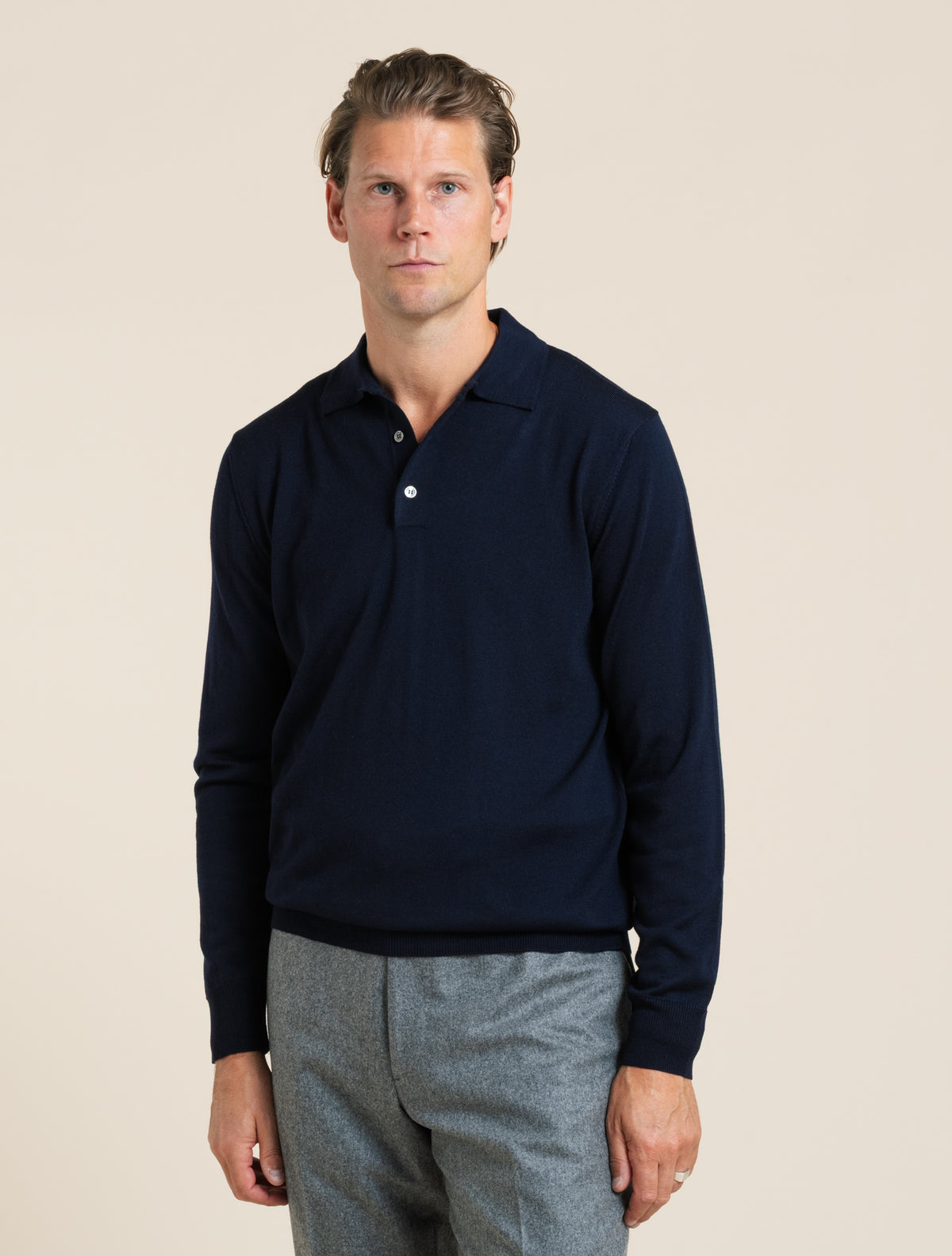 Stickad merino pikétröja marinblå