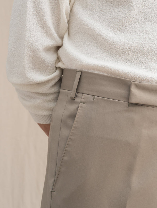 High-rise straight wool pants in beige - Wardrobe NYC